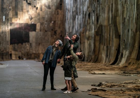 Family enjoying a self-guided audio tour on Cockatoo Island in Sydney Harbour
